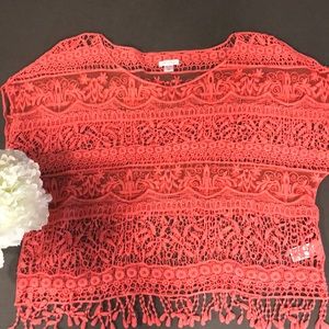 Lovely top to be worn over camisole or tank top.